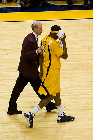 Randy Meador leads Jones off the court